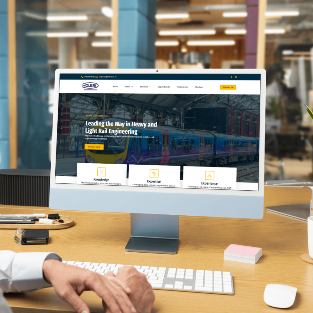 image of Holbro Engineering website on desktop computer